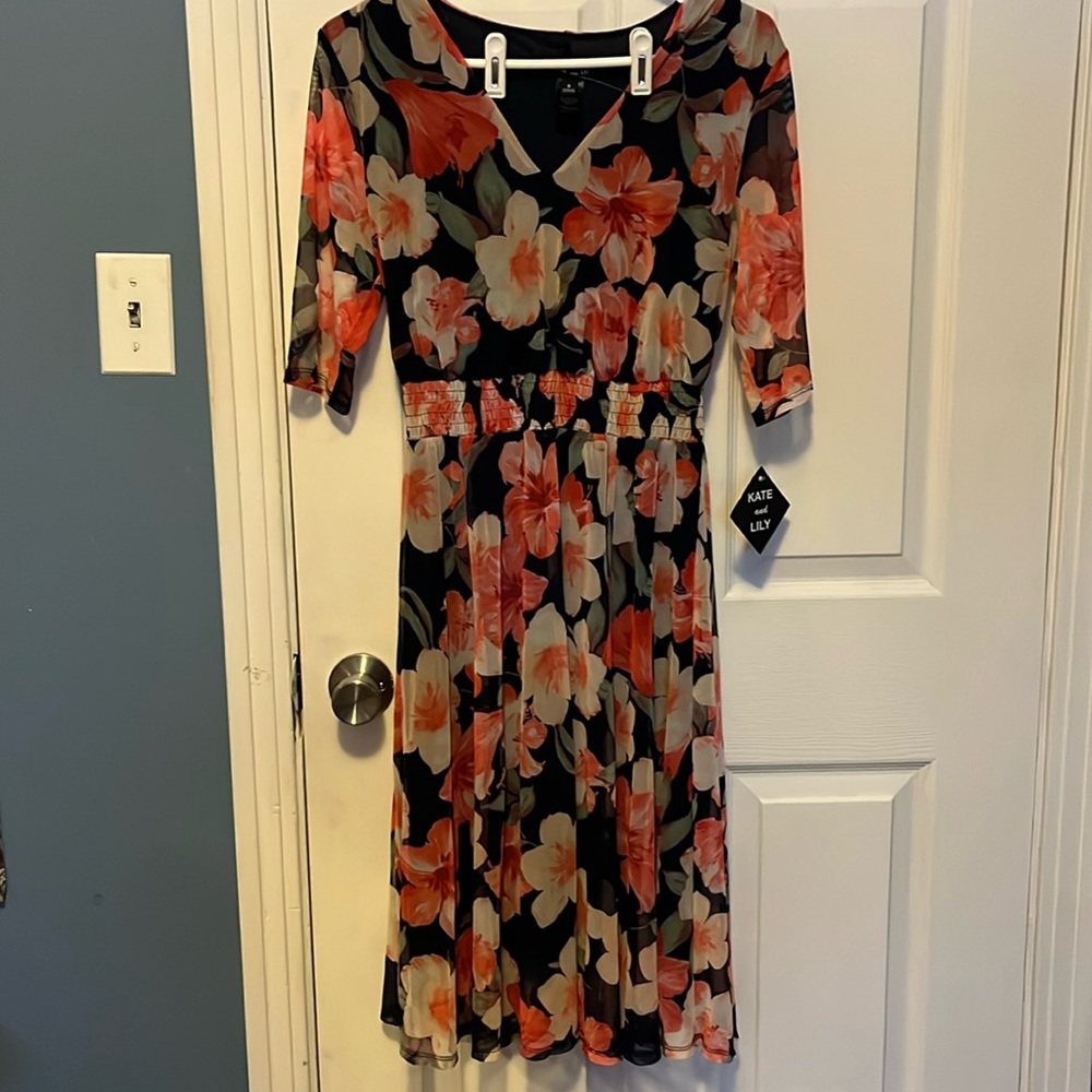 Tags on.  Kate and Lilly dress never worn